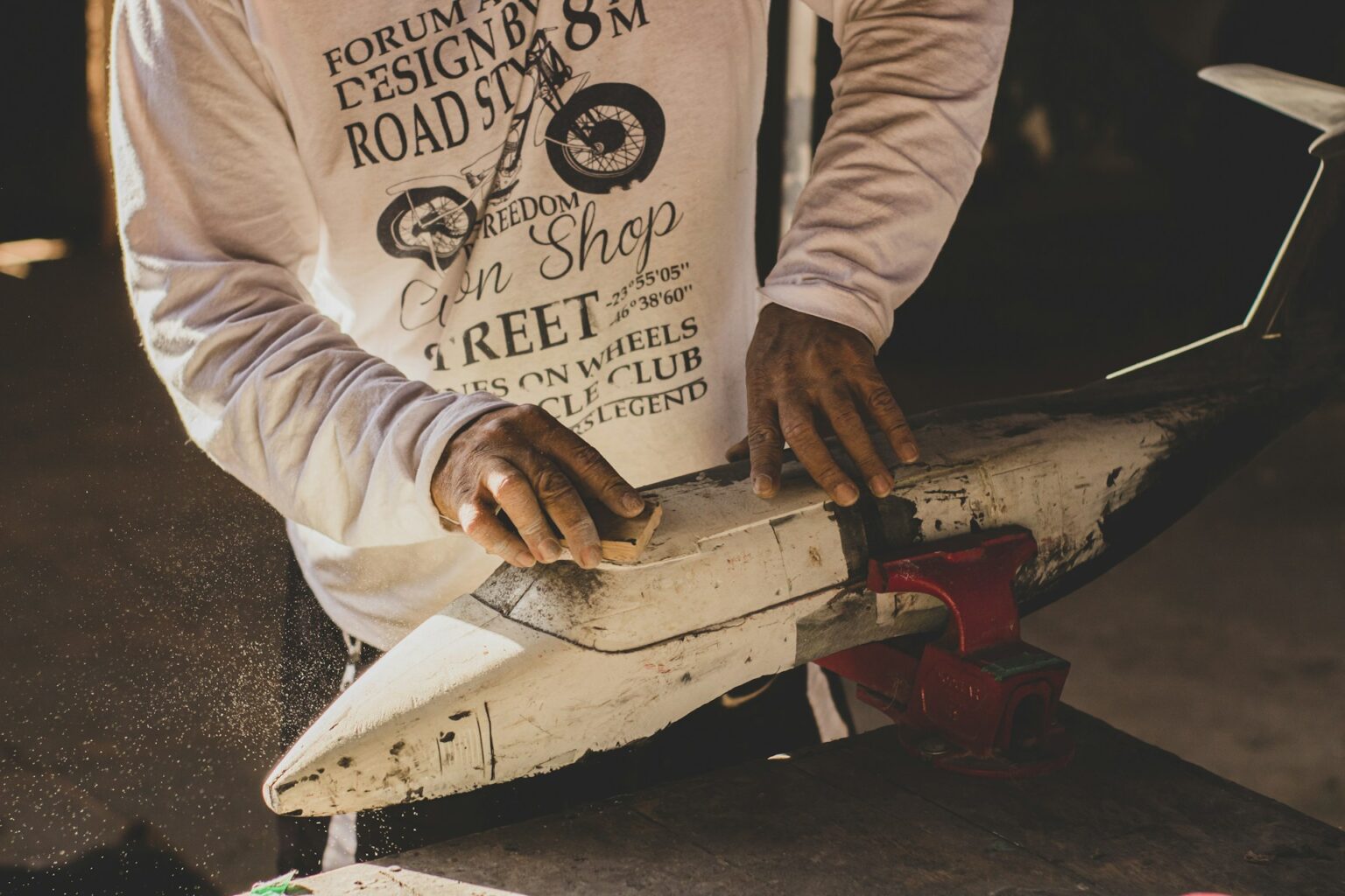 man working on model plane