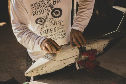 man working on model plane