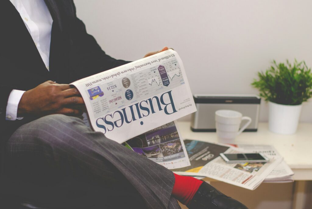 business man reading papaer