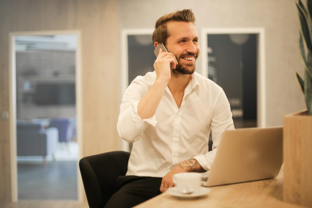 man doing business on phone