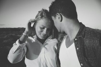 man looking at woman