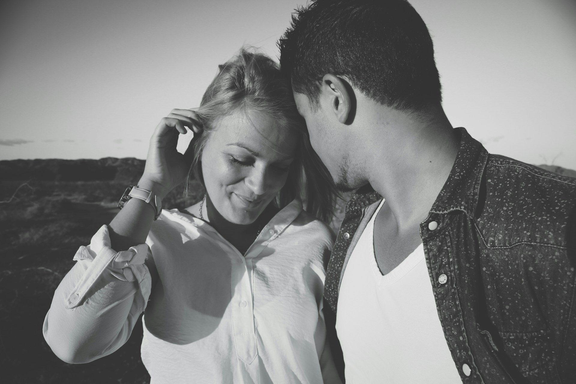man looking at woman