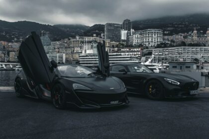 two sports cars at the docks