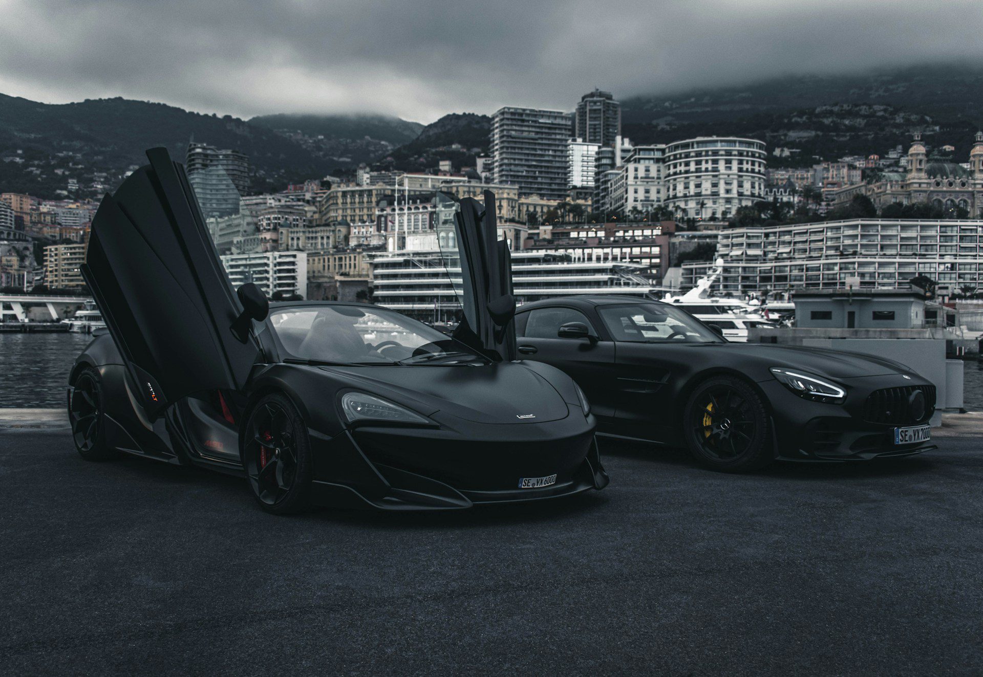 two sports cars at the docks