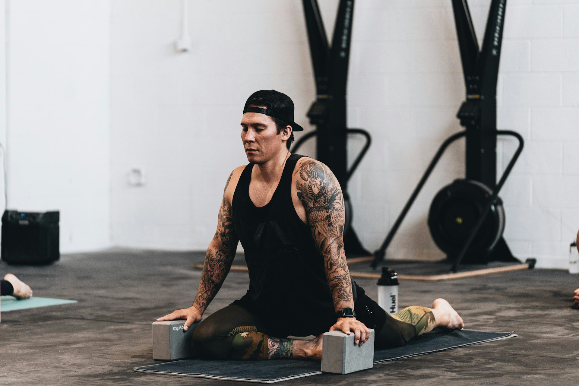 man stretching on blocks