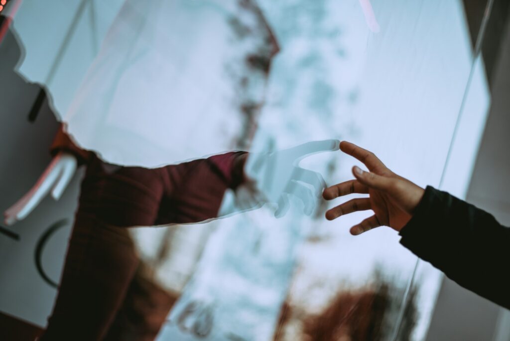 pointing into glass window