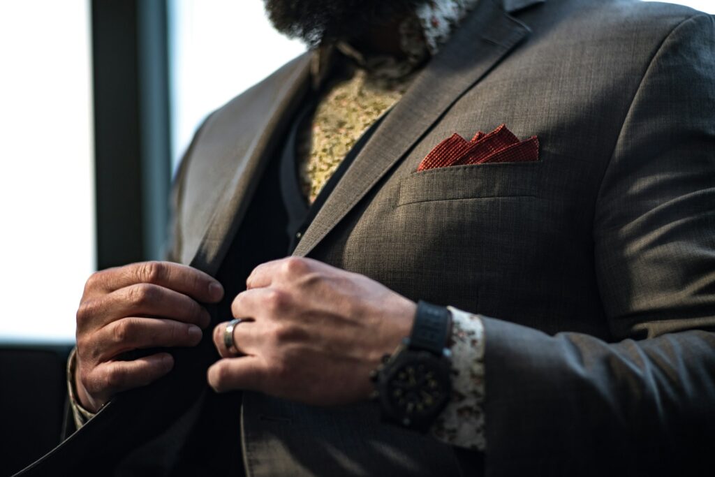 Tailored suit fitted on man