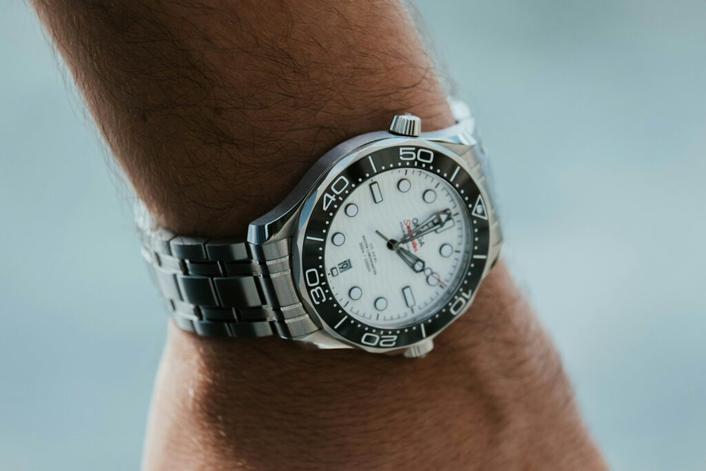 omega sea master on mans wrist